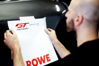 Cars are prepared for the Prologue