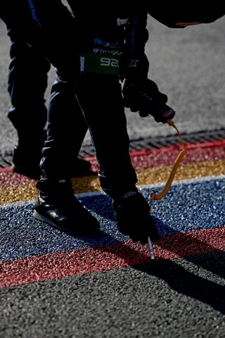 A mechanic in the pit lane
