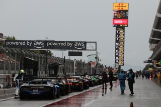 Cars in the pitlane under the Red Flag